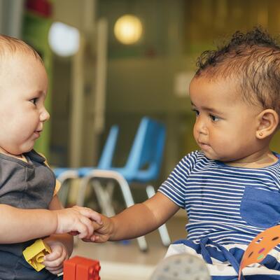 Babys playing together.