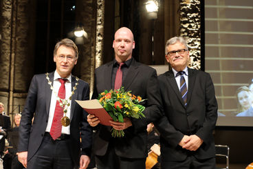 Verleihung des Eike-von-Repgow-Stipendiums 2015 an Dr. Pierre Fütterer [Foto: Landeshauptstadt Magdeburg]