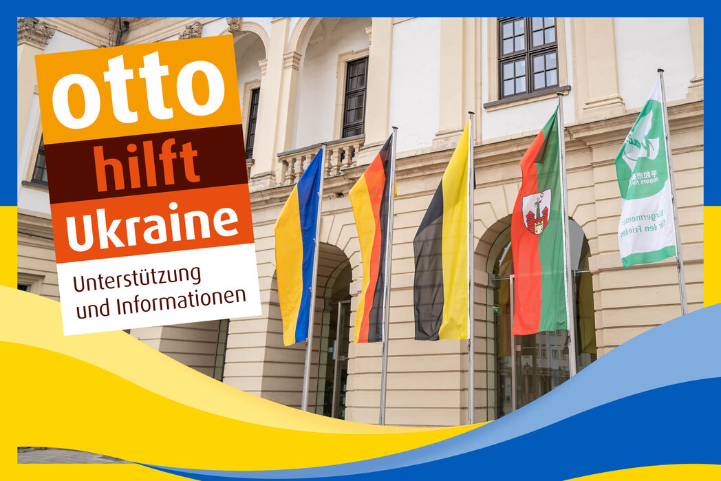 Rathaus Magdeburg mit Ukrainischer Flagge und Aufruf zur Unterstützung