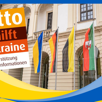 Rathaus Magdeburg mit Ukrainischer Flagge und Aufruf zur Unterstützung